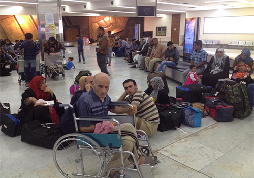 وصول-الوجبة-الثانية-من-اللاجئين-العراقيين-العالقين-في-تركيا-الى-مطار-بغداد1
